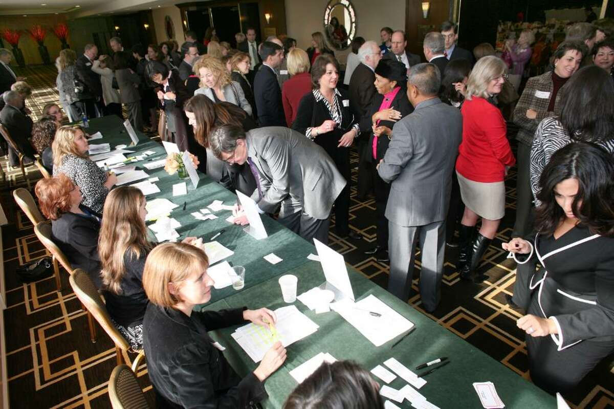 Attendees at this years 2010 Brava Awards sign in before the start of Friday's ceremony held at the Hyatt Regency Greenwich.