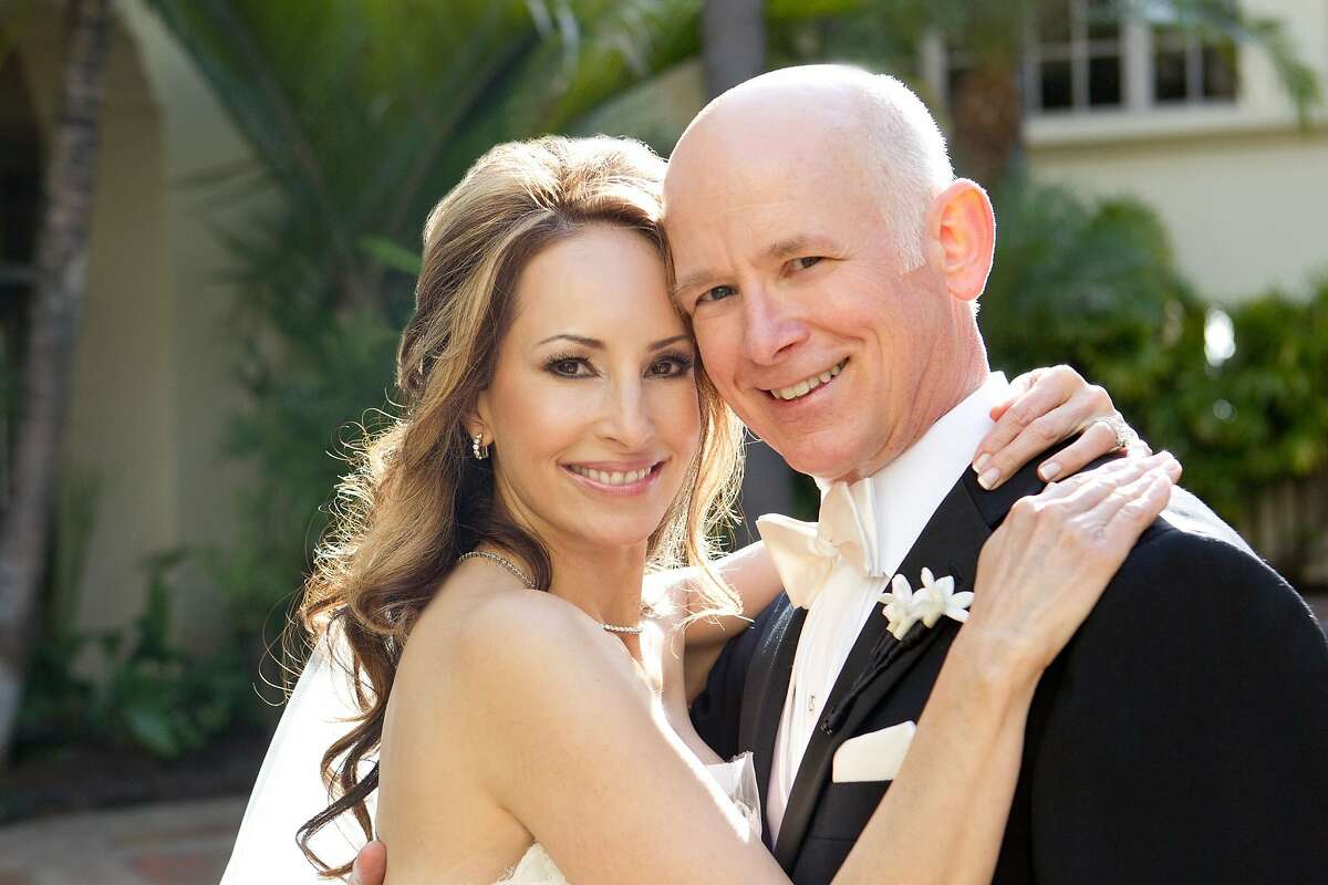 Carol Romero and Larry Blair on their wedding day. The couple met via Amy Andersen's dating company, Linx Dating.