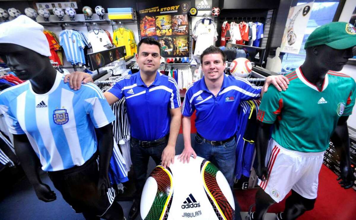 Gus Avalos, left, and Paul Melitsanopoulos, in Soccer & Rugby Imports, a Ridgefield business, on Monday, Jan.25,2010.