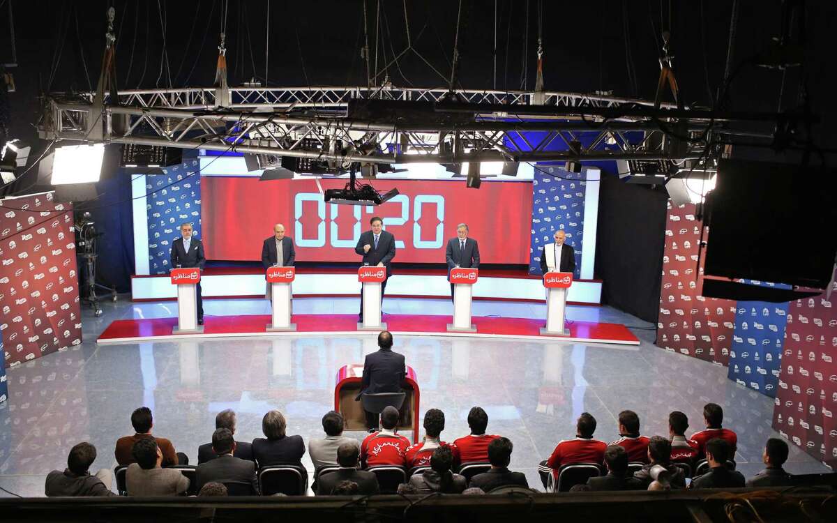 Afghanistan presidential election candidates to replace Hamid Karzai, who is ineligible for a third term, attend the first presidential election debate at the Tolo TV building, a private TV station, in Kabul.