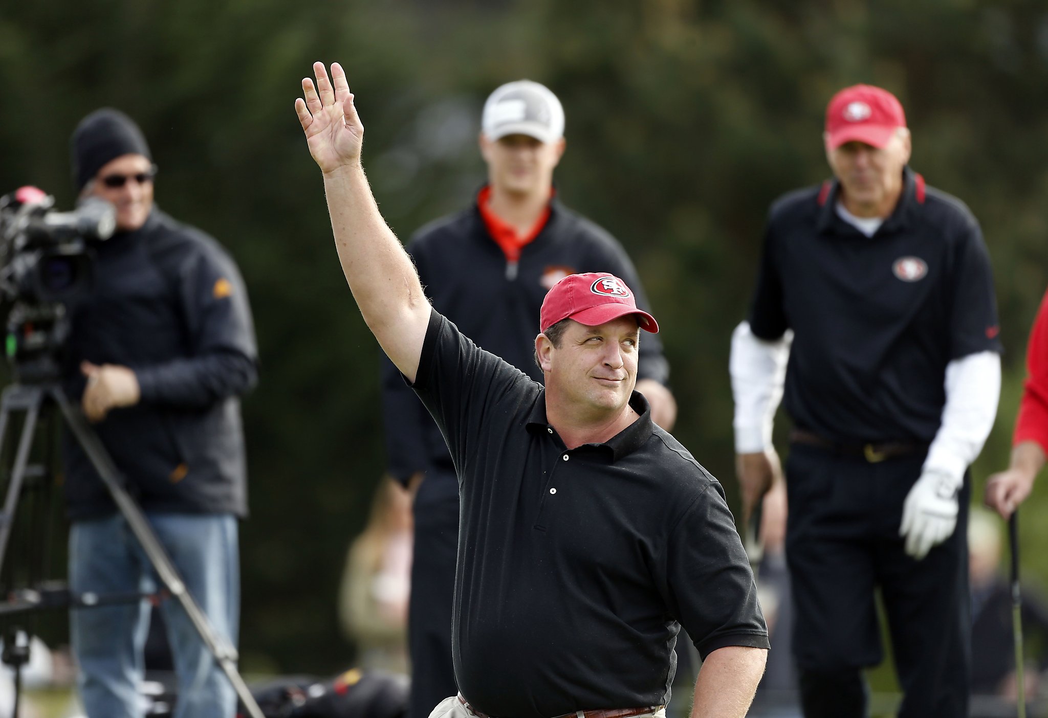 Former San Francisco 49ers players Harris Barton and Alex Smith, now with  the Kansas City Chiefs during the Chevron Charity Shoot-Out. Members of the San  Francisco 49ers versus members of the San