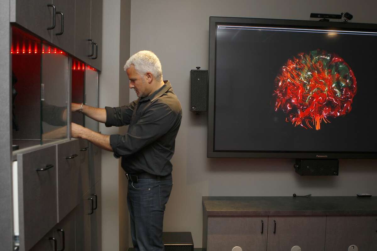 Director Dr. Adam Gazzaley of the Gazzaley Lab at the UCSF Neuroscience Imaging Center in San Francisco, Calif., shows how the lab studies neural mechanisms through gaming on Tuesday, February 4, 2014.