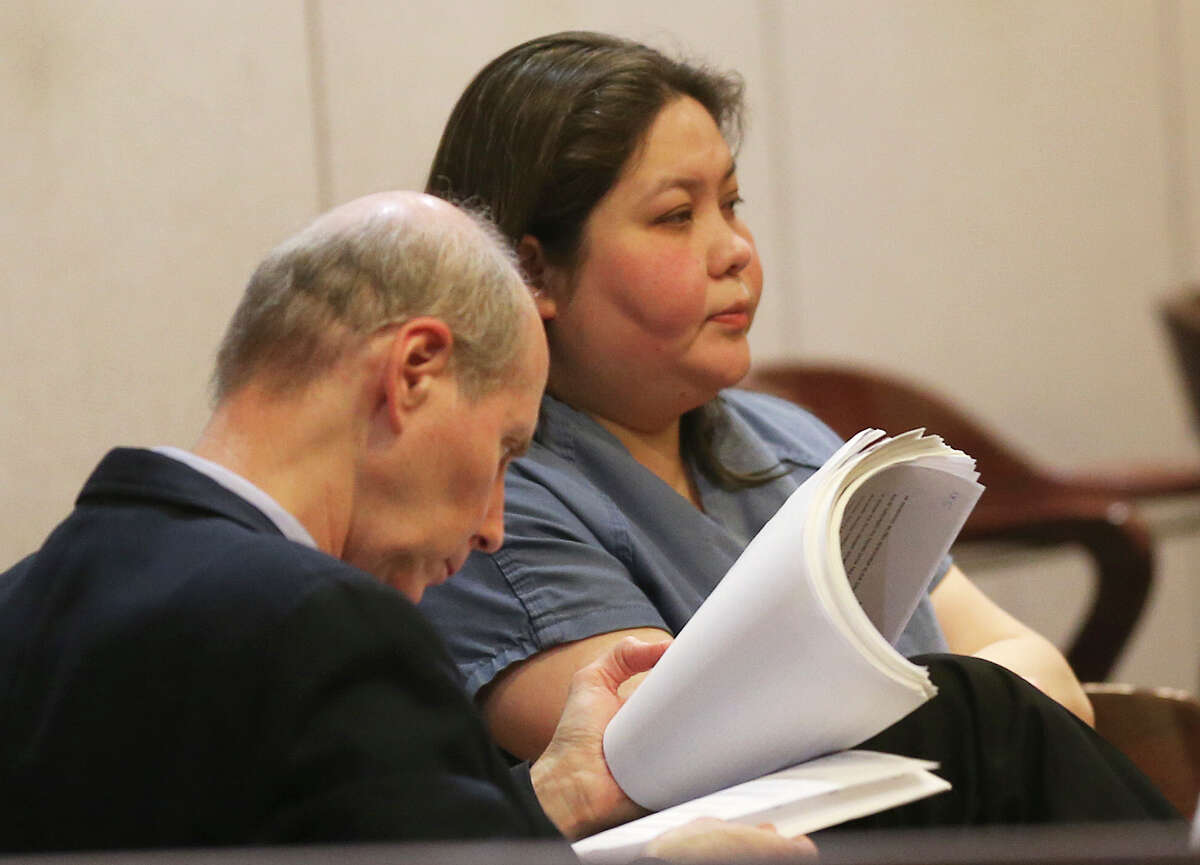 Asel Abdygapparova goes before Bexar County 399th District Court Judge Ray Olivarri for a possible plea, Thursday, Feb. 6, 2014.