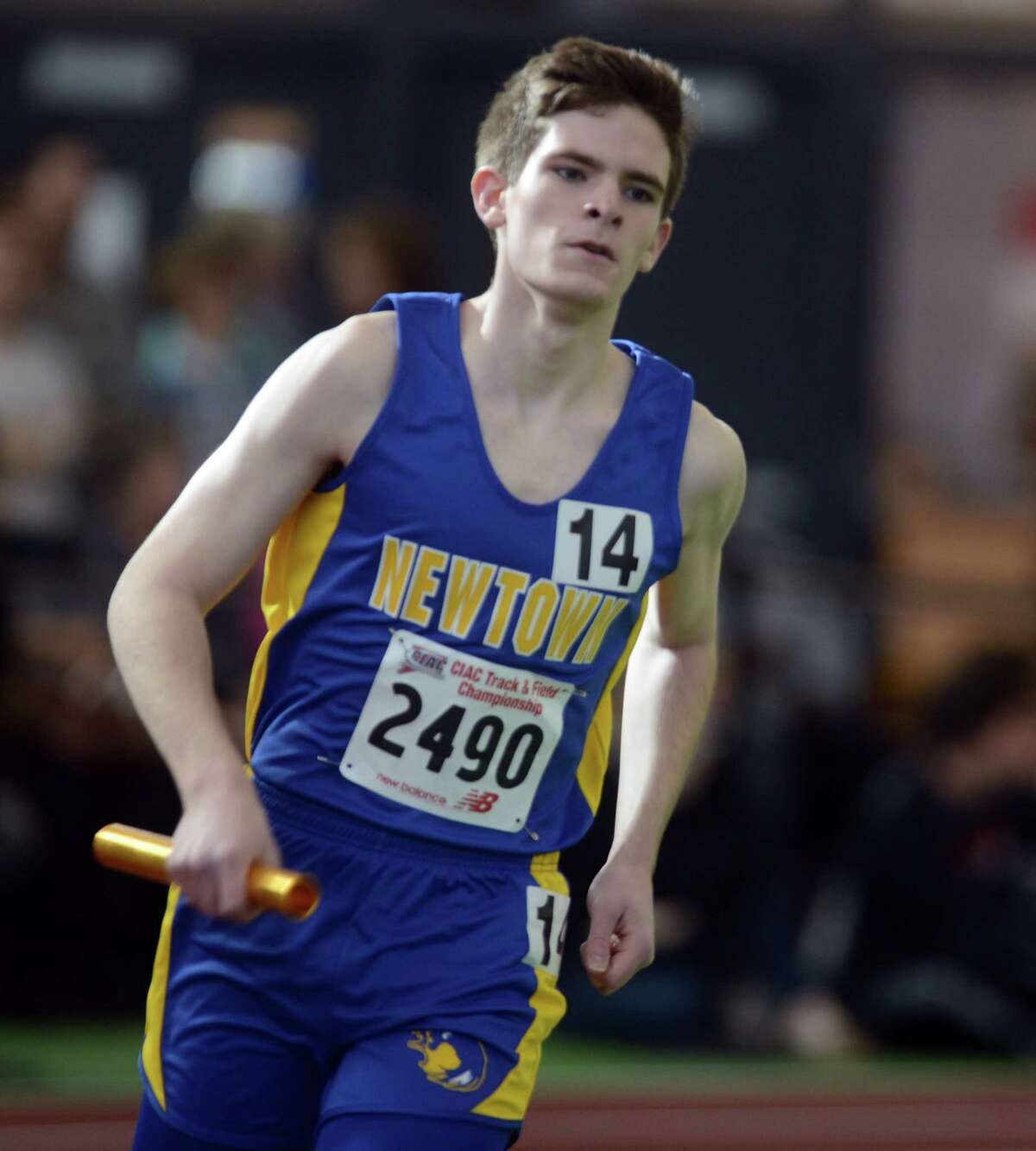 Newtown's Nick Swenson competes in the 4x800 meter relay Saturday, Feb. 8, 2014, during the CIAC Class LL Boys and Girls track championships at the Floyd Little Athletic Center in New Haven, Conn.