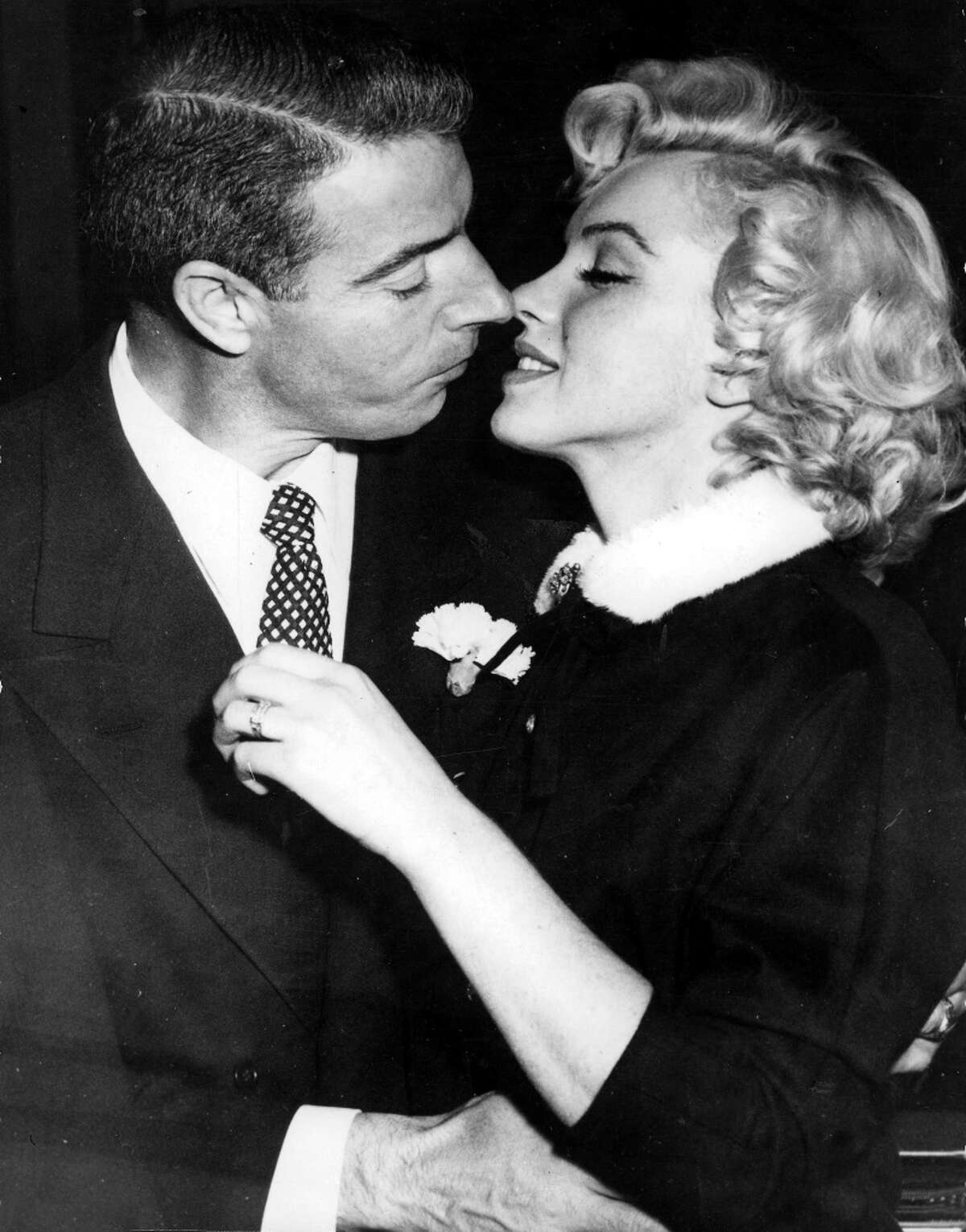 Marilyn Monroe and Joe DiMaggioIt doesn't get more American than this union: a blond bombshell actress and a beloved baseball player. Though the relationship had its ups and downs, as evidenced by the couple's divorce in 1954, the couple's union truly was 'til death do us part.' When Monroe died of a drug overdose in 1962, it was DiMaggio who claimed her body. He also had a dozen red roses delivered to her tombstone twice a week for the next 20 years.
