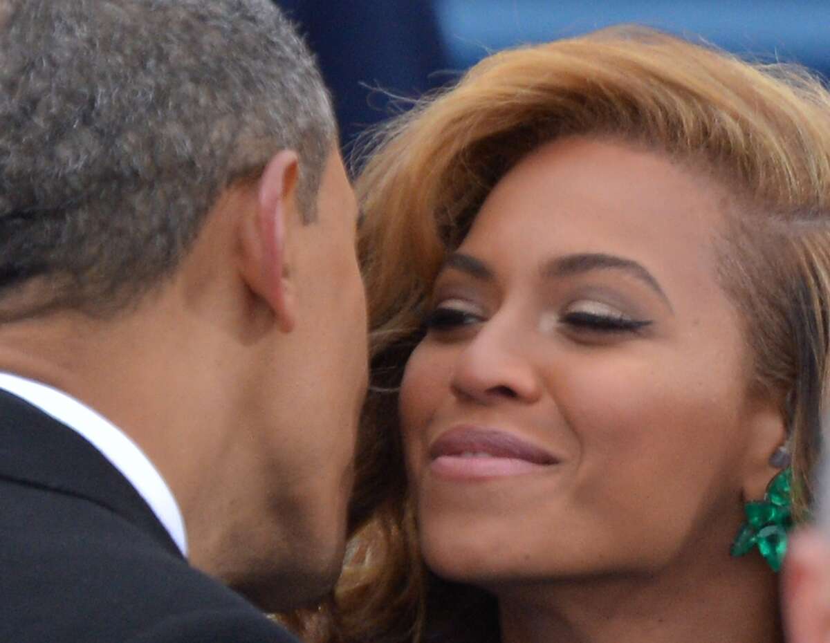 President Barack Obama greets singer Beyonce during the 57th Presidential Inauguration ceremonial swearing-in at the US Capitol on January 21, 2013 in Washington, DC.