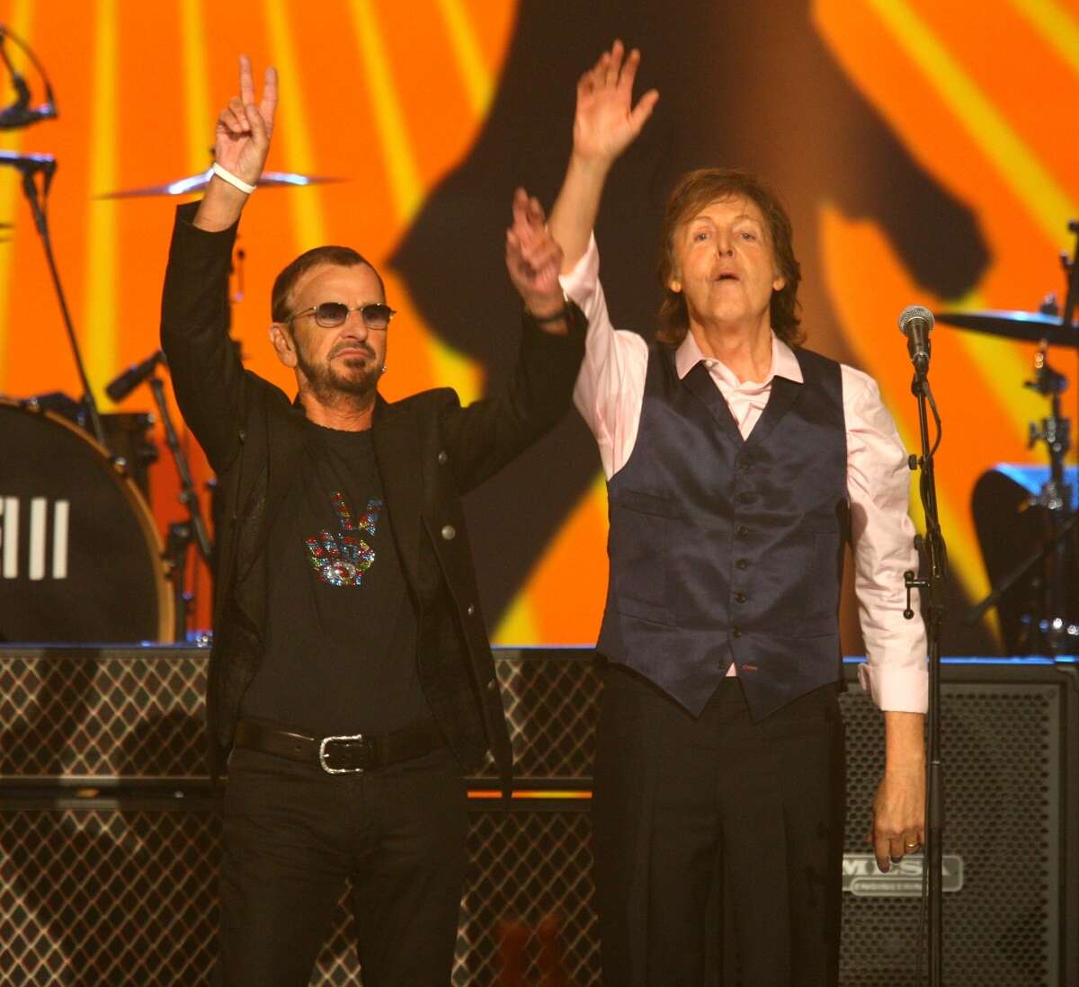 Ringo Starr and Paul McCartney perform at The Night that Changed America: A Grammy Salute to the Beatles, on Monday, Jan. 27, 2014, in Los Angeles.