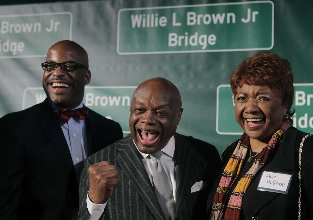 Willie Brown stands between state Assemblyman Isadore Hall, from Compton, and Alice Huffman, president of the California chapter of the NAACP, at a ceremony on Treasure Island to dedicate the renaming of the western Bay Bridge span after Willie Brown in San Francisco, Calif. on Tuesday, Feb. 11, 2014. Hall introduced the legislation to rename the bridge at the suggestion of Huffman.