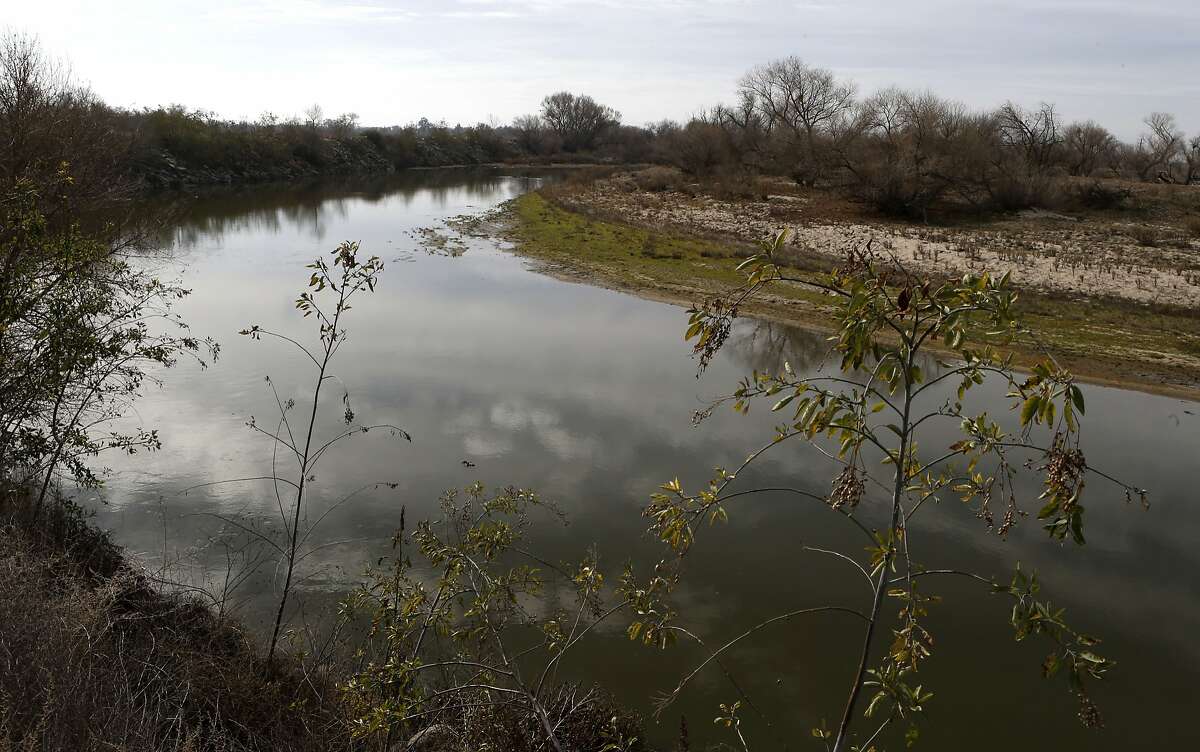 The San Joaquin River bends through the Central Valley East of Patterson, Calif., on Monday Jan. 27, 2014. Central Valley Republicans raise the stakes on the California drought by inserting their plan to divert water to farms into the farm bill, a giant piece of legislation that has been under negotiations for three years.