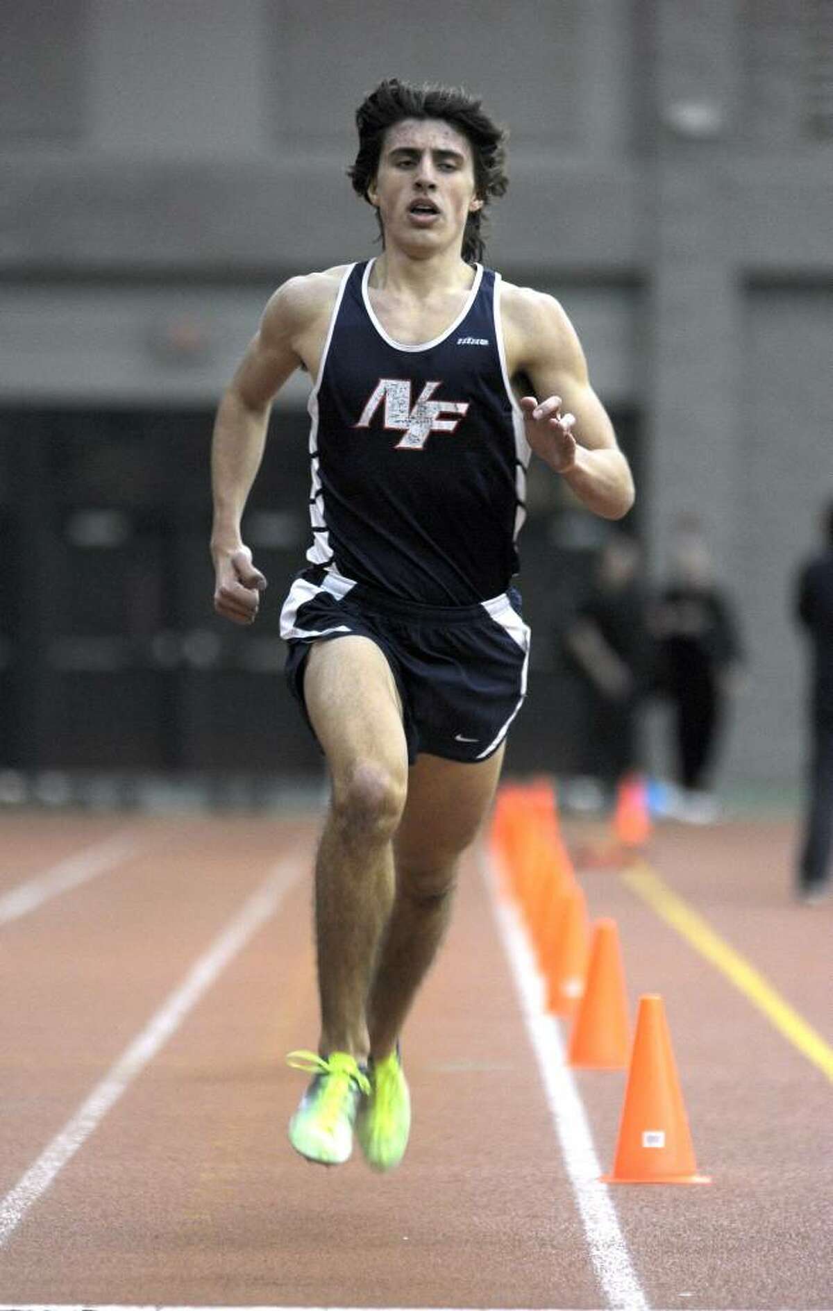John Raneri, 18, of New Fairfield, winner of the 1600 meter race at the Southwest Conference Indoor Track and Field Championships, Saturday, February 6, 2010