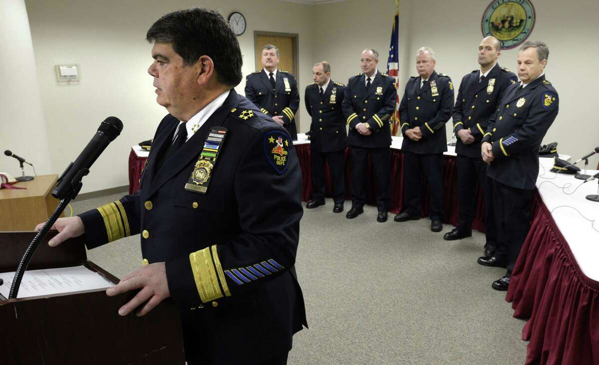 Troy Police Commissioner Anthony Magneto takes the podium for the final time to welcome three new members of the Troy Police Department Friday afternoon, Feb. 14, 2014, in Troy, N.Y. Magneto leaves the office of Commissioner today. (Skip Dickstein/ Times Union)