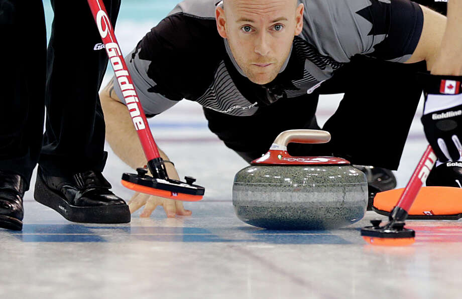 Ryan Fry, who won Canada's gold medal in curling at the 2014 Olympic Winter Games, was one of the curlers suspended for the Red Deer Curling Classic in Alberta. Photo: Wong Maye-E, AP / AP