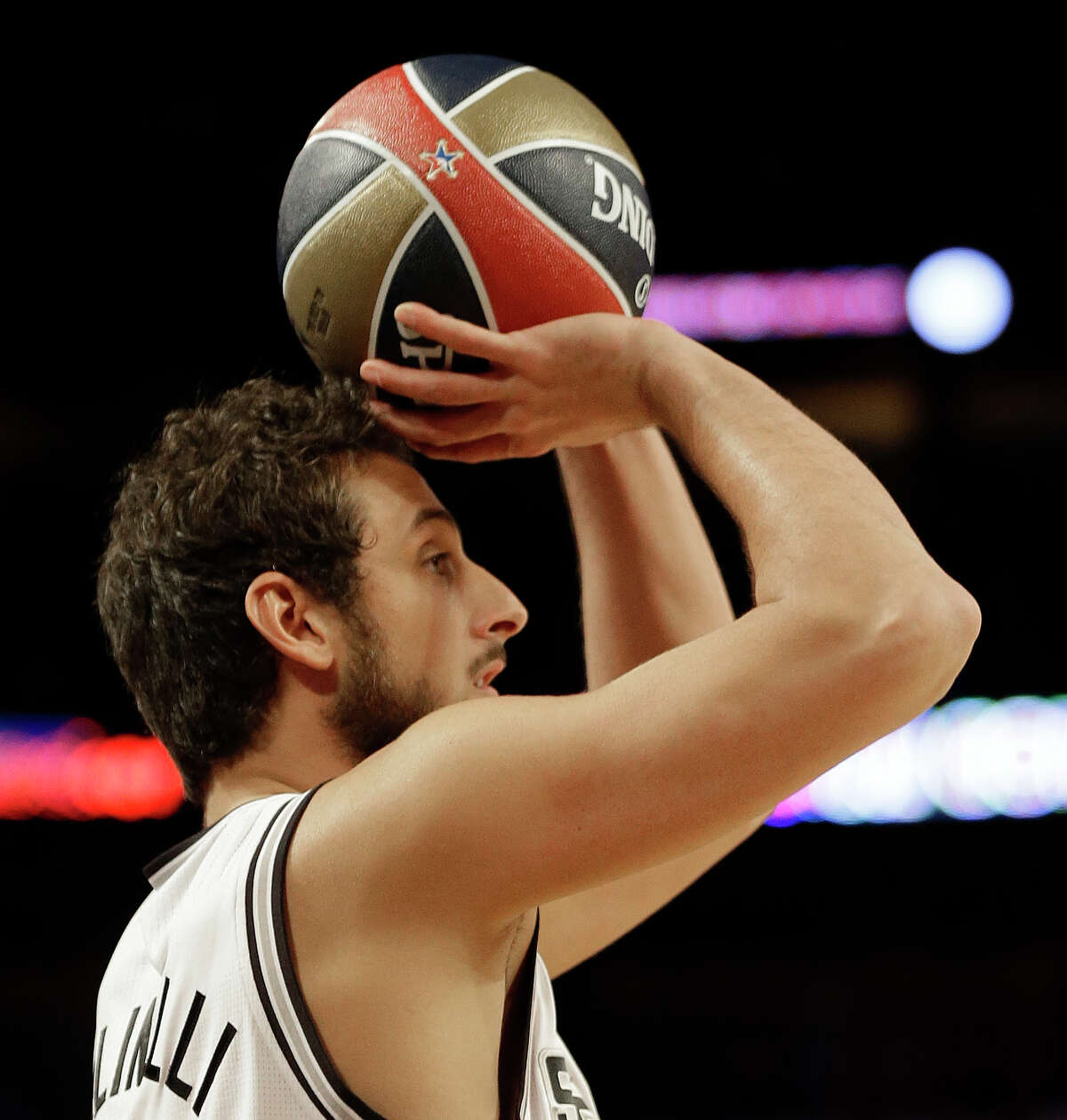 Marco Belinelli of the San Antonio Spurs shoots during the skills competition at the NBA All Star basketball game, Saturday, Feb. 15, 2014, in New Orleans. (AP Photo/Gerald Herbert)
