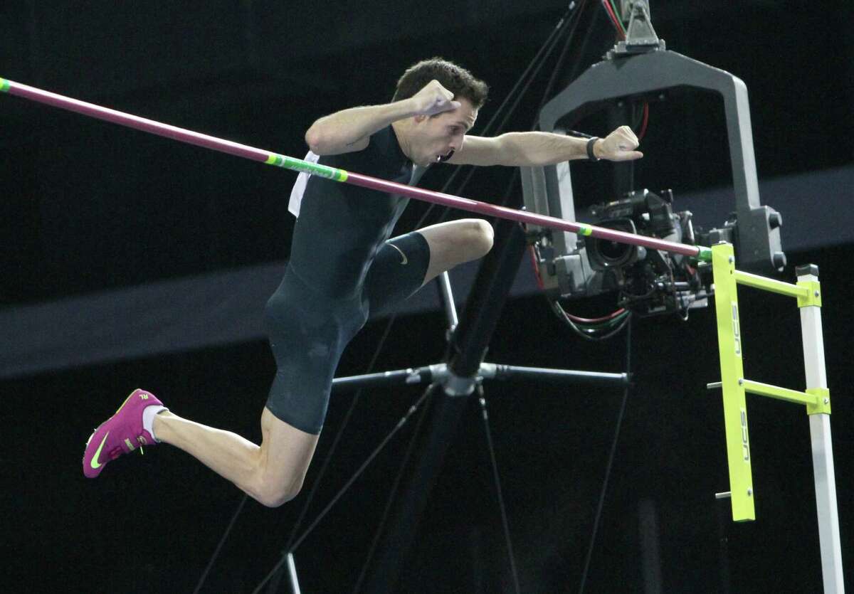 France's Renaud Lavillenie clears the bar at 21 feet, 21/2 inches Saturday at an indoor track and field meet in Donetsk, Ukraine, breaking Sergei Bubka's 21-year-old world record of 21-2.