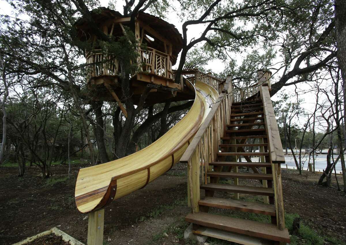 A treehouse at the Anne Frank Inspire Academy was designed and built by Pete Nelson of Animal Planet's “Treehouse Masters.” He said his crew's biggest source of pride in the project is the 26-foot-long slide.
