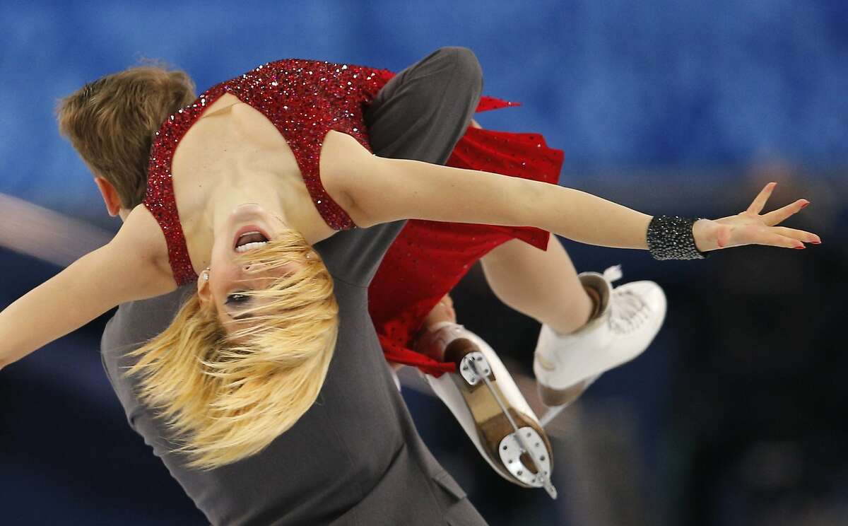 Isabella Tobias and Deividas Stagniunas of Lithuania compete in the ice dance free dance figure skating finals at the Iceberg Skating Palace during the 2014 Winter Olympics, Monday, Feb. 17, 2014, in Sochi, Russia.