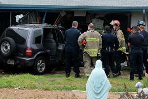 SUV crashes into Northeast Side house