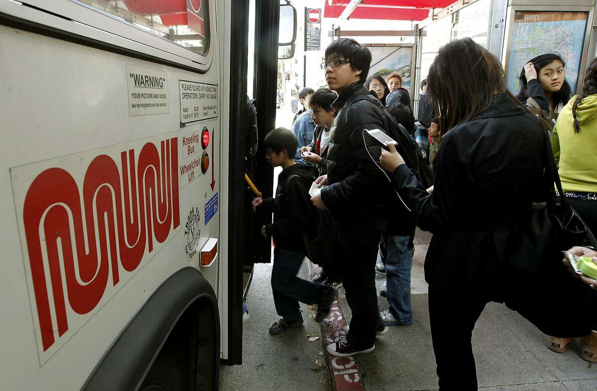 In this file photo, students board a MUNI bus after school at the corner of Van Ness Ave. and Chestnut St in San Francisco. Google has agreed to fund the San Francisco Municipal Transportation Agency's program to provide free MUNI all youths between the ages of five and seventeen years for two years at a cost of $6.8 million.