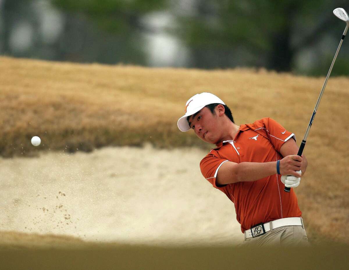 Doug Ghim blasts out of a green side bunker on No. 11 during the final round of the CB&I Boys Championship, Monday, February 17, 2014, at The Club at Carlton Woods' Fazio Championship Course in The Woodlands. Ghim won the tournament by five strokes over Carl Yuan and Andy Zhang.