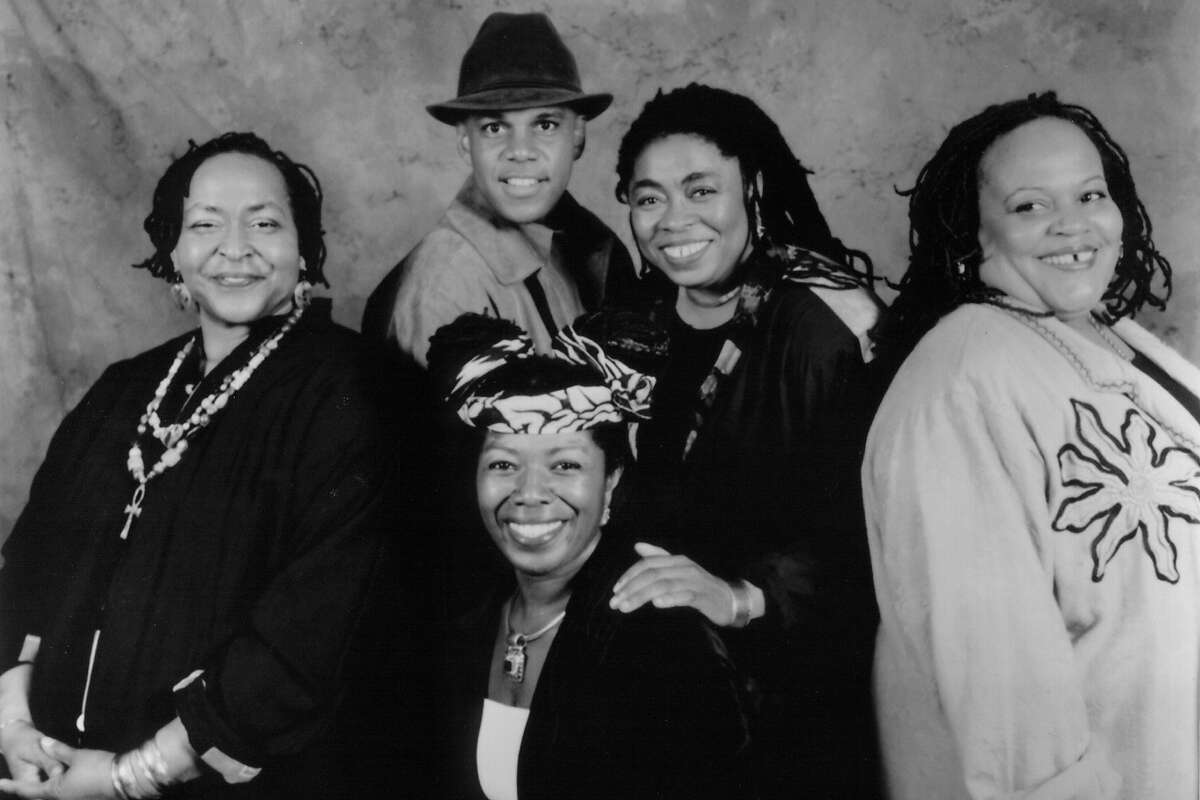 The four in the back row, from left to right are: Linda Tillery, Lamont Van Hook, Melanie DeMore and Rhonda Benin. In the forefront isÊEloise Burrell. The Cultural Heritage Choir, assembled by Linda Tillery, will perform Feb. 1 at Showcase Theatre, Marin Center, in San Rafael.