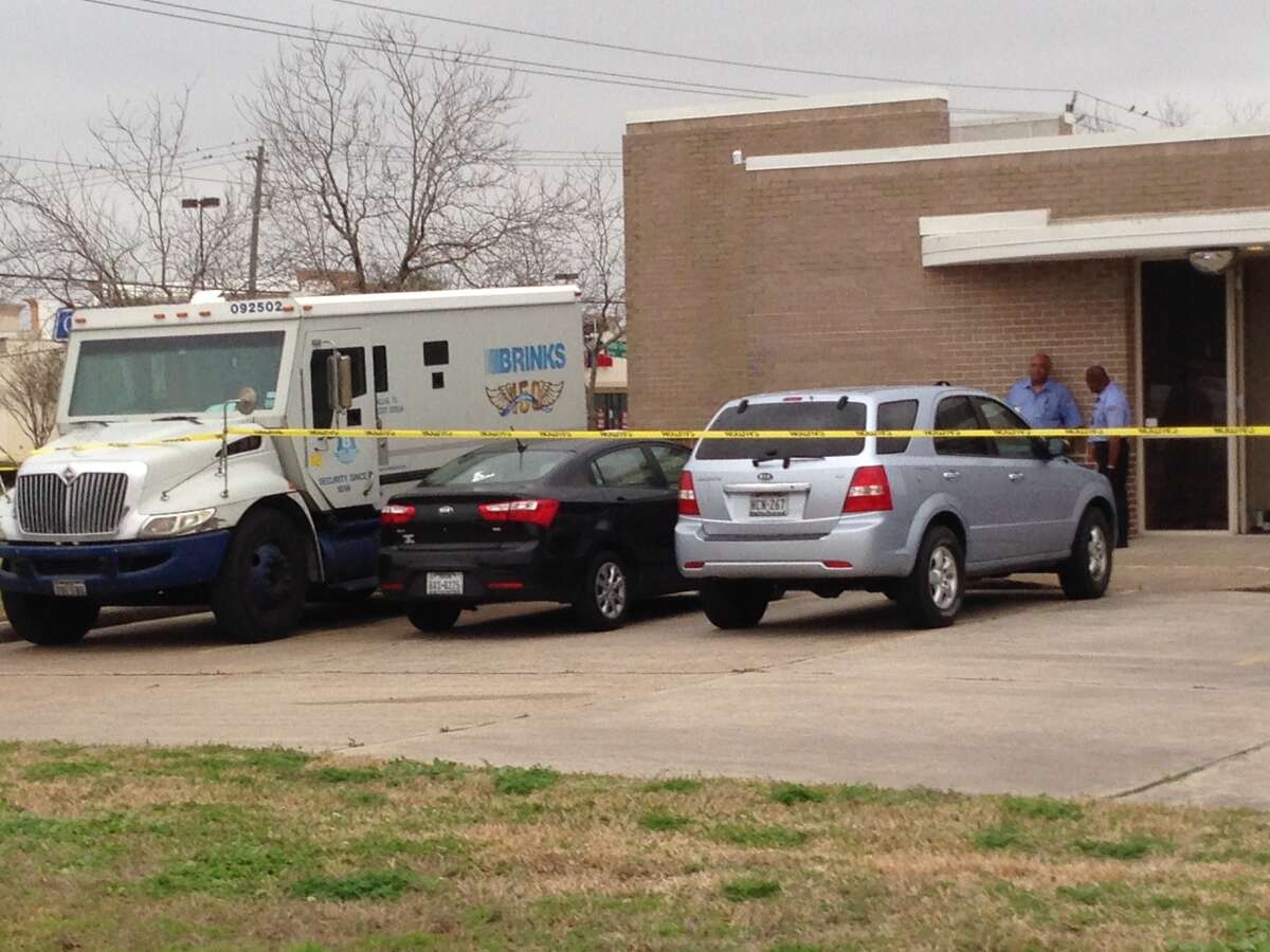 An armored-car guard was shot twice outside a Wells Fargo branch in Houston on Thursday.