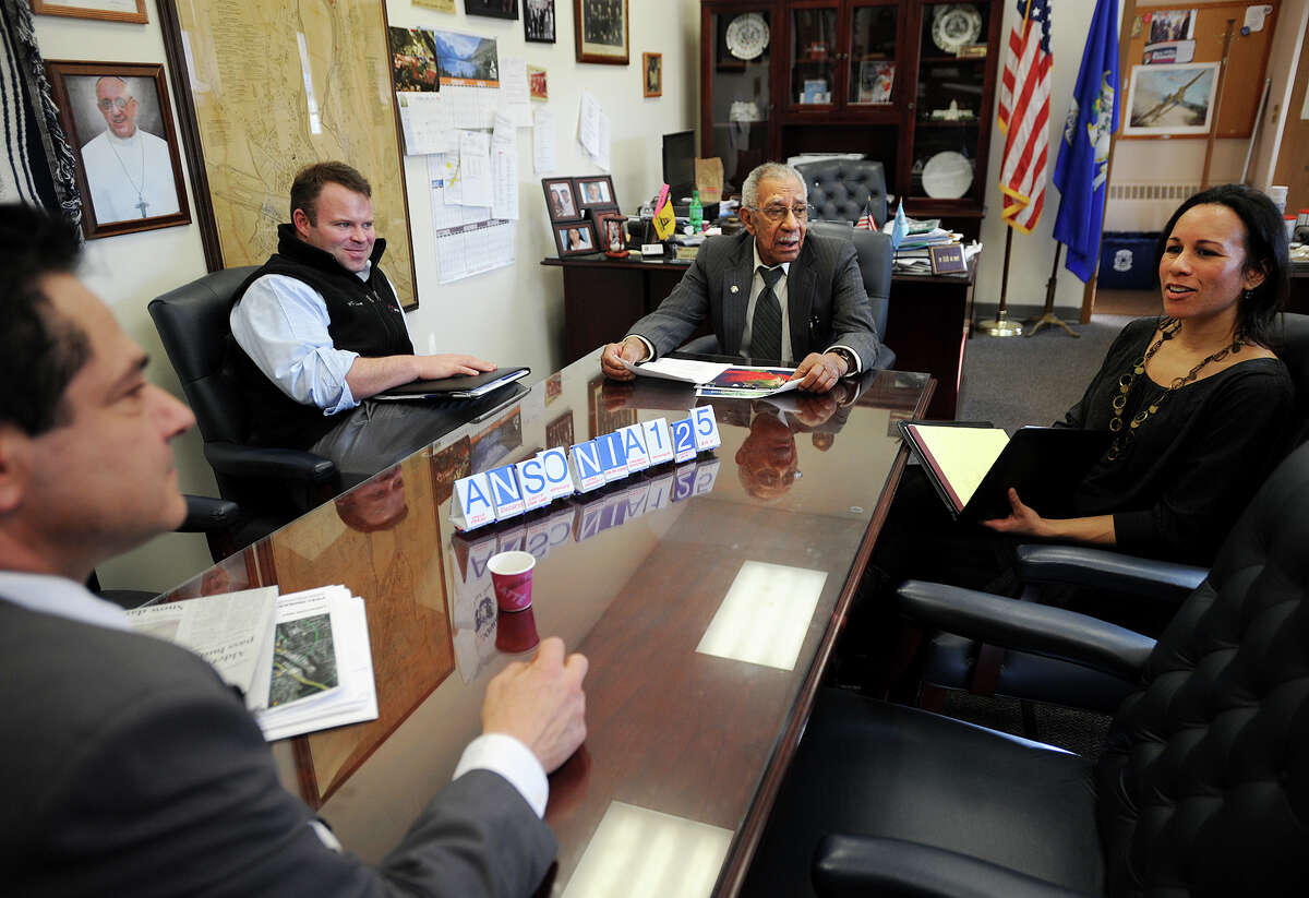 From left; Ansonia Mayor David Cassetti, Chief of Staff Chris Tymniak, Alfonso Smith, and Janelle Coolich, of Vision Internet, discuss the city's website in a meeting at City Hall in Ansonia, Conn. Smith served as mayor for a day on Thursday, February 20, 2014.