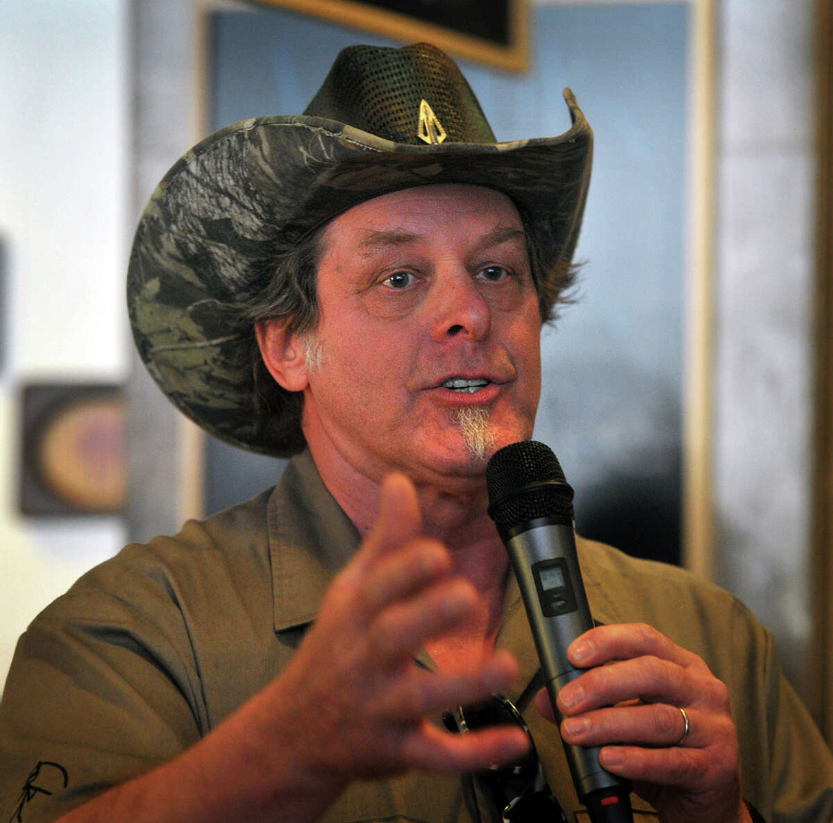 Rocker Ted Nugent speaks to a crowd of Greg Abbott supporters during a campaign stop in Wichita Falls, Texas on Tuesday, Feb. 18, 2014. (AP Photo/Wichita Falls Times Record News, Torin Halsey)