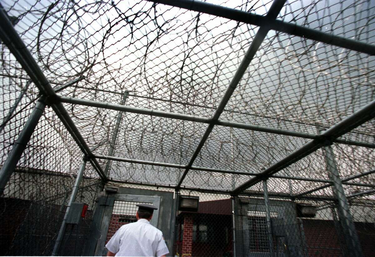 A prison guard passes through the entrance to the prison housing units at the Franklin County Correctional facility in Malone, N.Y. (Steve Jacobs/Times Union archive)