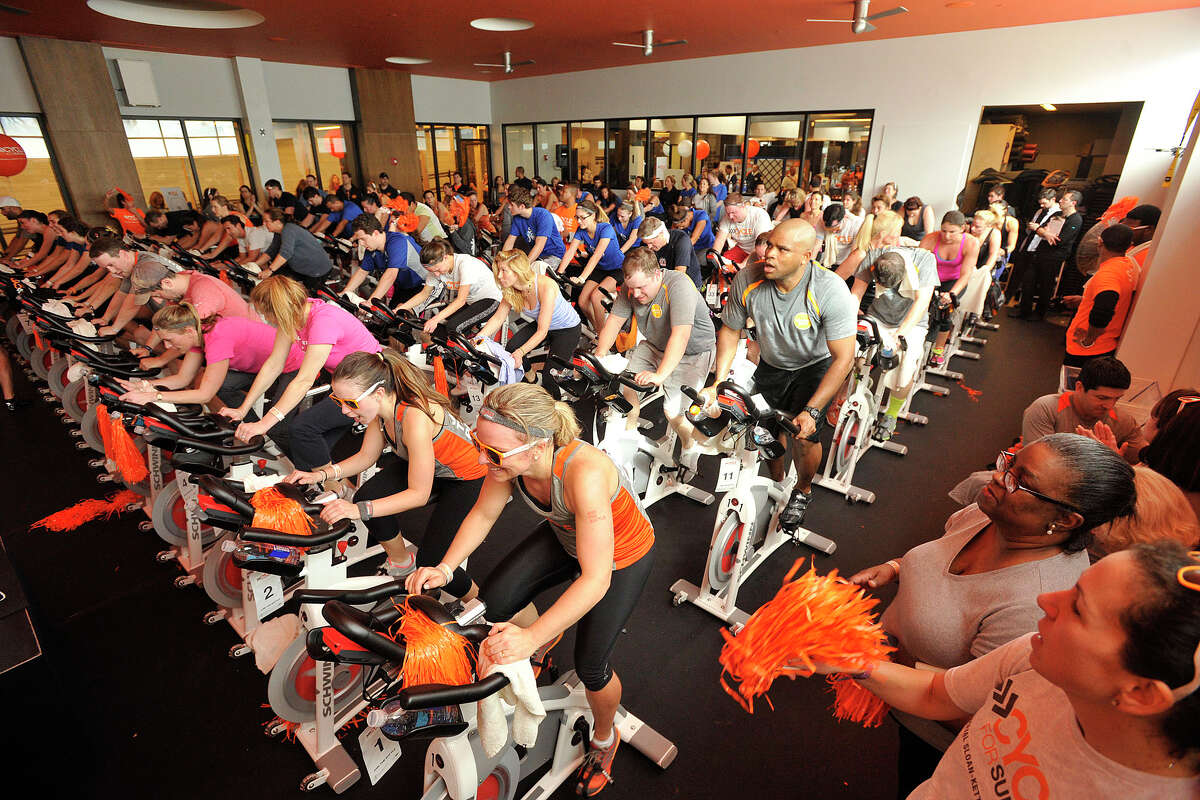A room of cyclists participate in the Cycle for Survival event benefiting Memorial Sloan Kettering Cancer Center at Equinox fitness center in Greenwich, Conn., on Sunday, Feb. 23, 2014. Nationally, Cycle for Survival has raised over $47 million for rare cancer research since 2007.