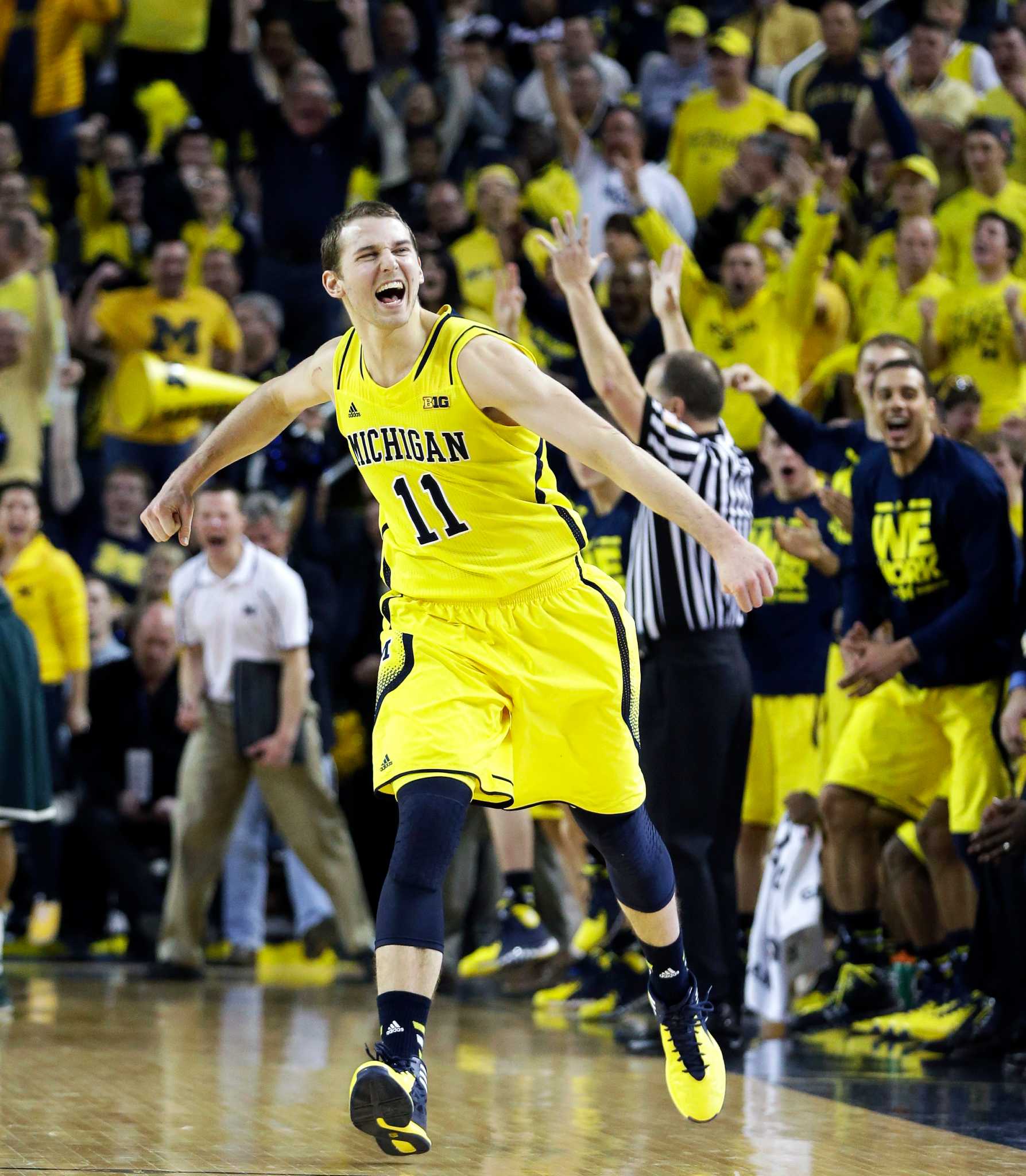 Michigan in first with win