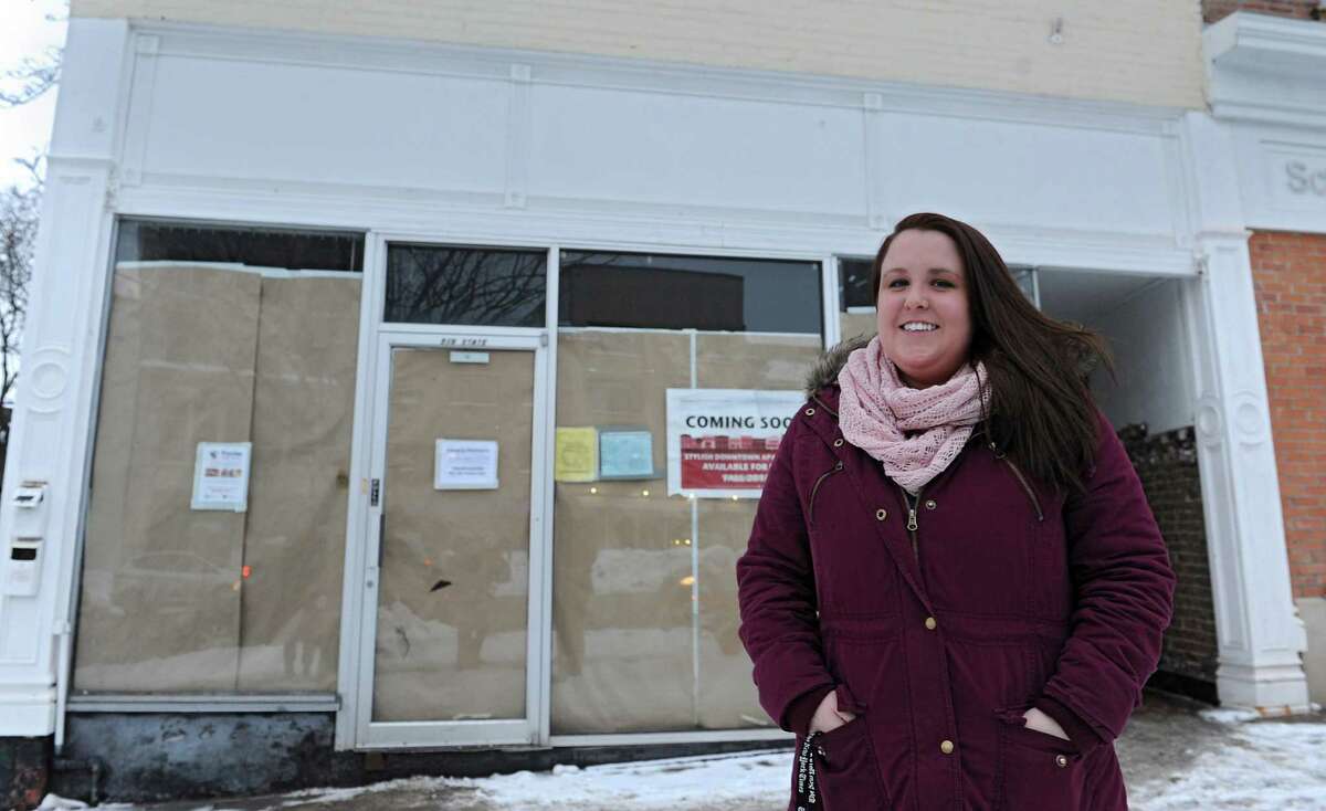 Sara Mae Hickey, founder and president of The Autism Initiative, stands in front of the construction site for Puzzles Bakery & Cafe on State St. on Wednesday, Feb. 19, 2014, in Schenectady, N.Y. The cafe, which will open in the Spring, will be a place for adults with autism to work. Sara Mae's sister is on the autism spectrum. (Lori Van Buren / Times Union)