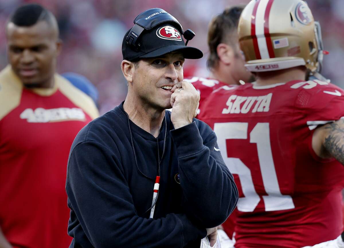 49er head coach Jim Harbaugh watched the action on the field in the second half. The San Francisco 49ers defeated the St. Louis Rams 23-13 at Candlestick Park Sunday December 1, 2013.