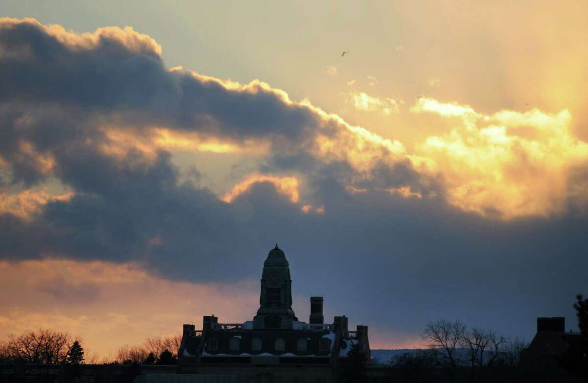 Philip Livingston Magnet Academy is backlit by a brilliant sunset Monday afternoon, Feb. 24, 2014, in Albany, N.Y. (Will Waldron/Times Union)