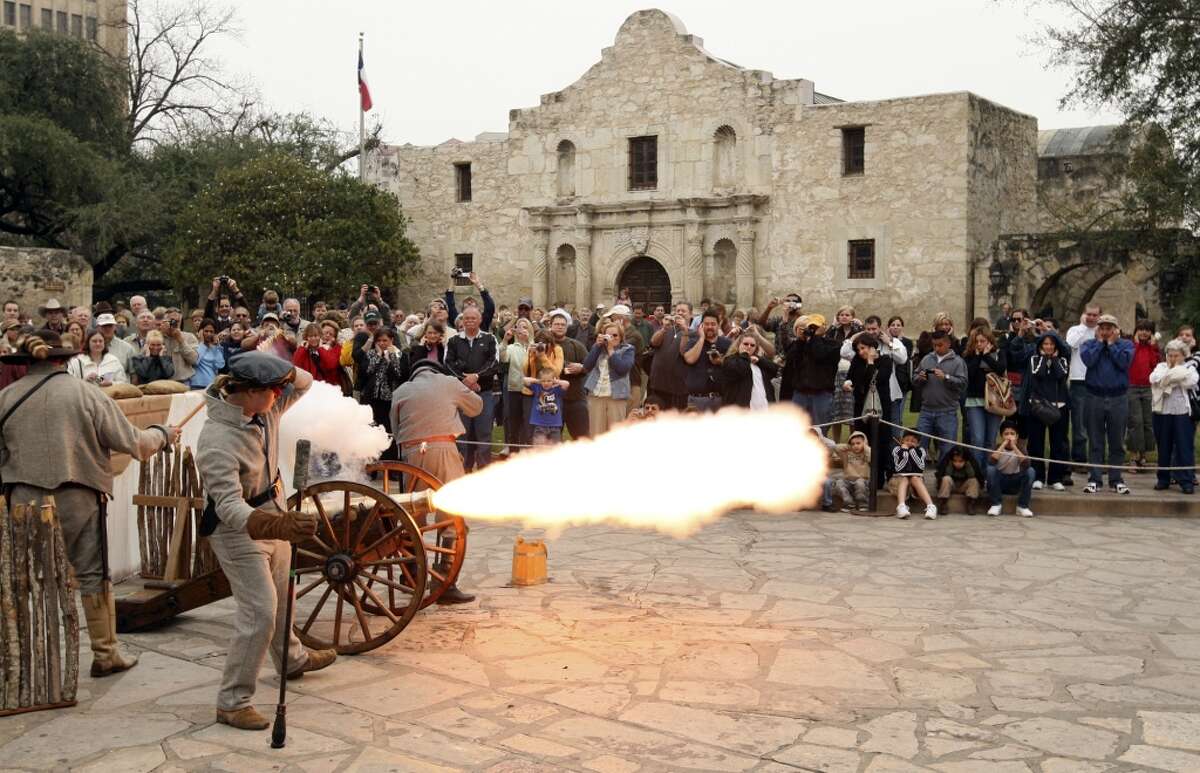 Members of the San Antonio Living History Association fire a cannon during "Glory At The Alamo," marking the beginning of the Alamo seige, Feb. 23, 2008, at Alamo Plaza.