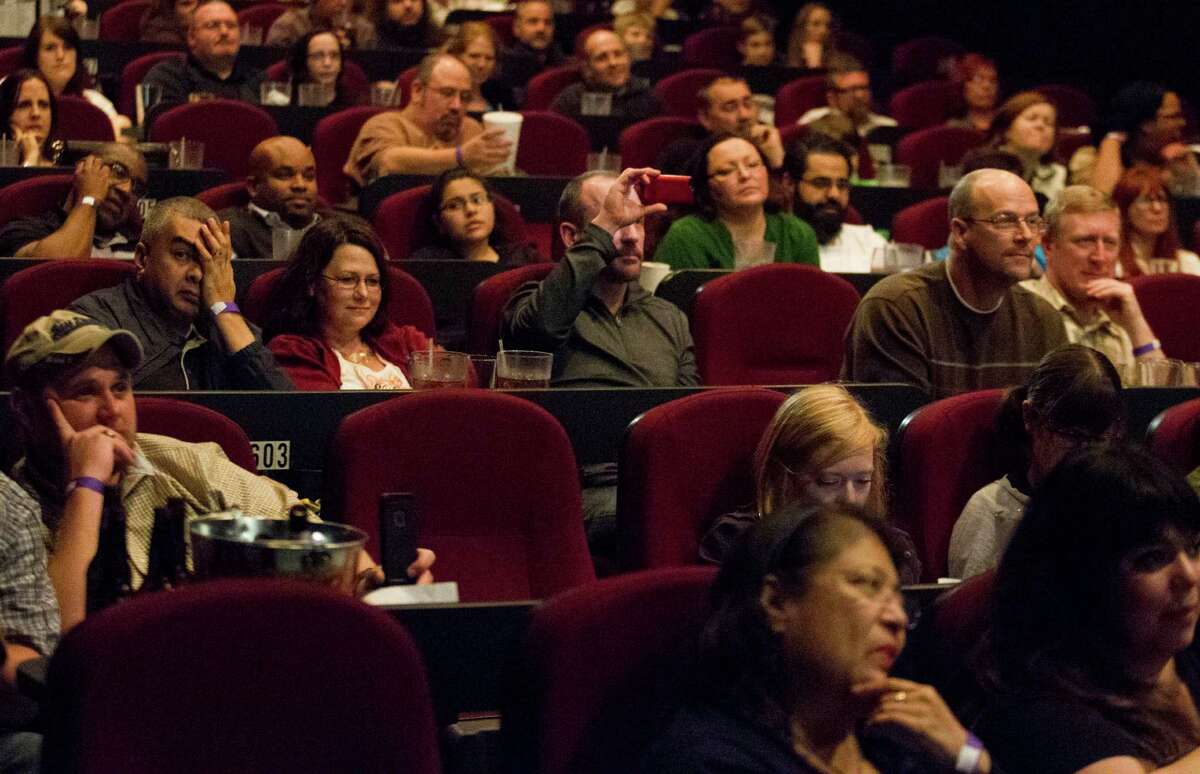 Believers and non-believers alike listen to self-proclaimed "master tracker" Rick Dyer as he fields questions at the Alamo Drafthouse in Katy. Dyer says he killed the Bigfoot in 2012.