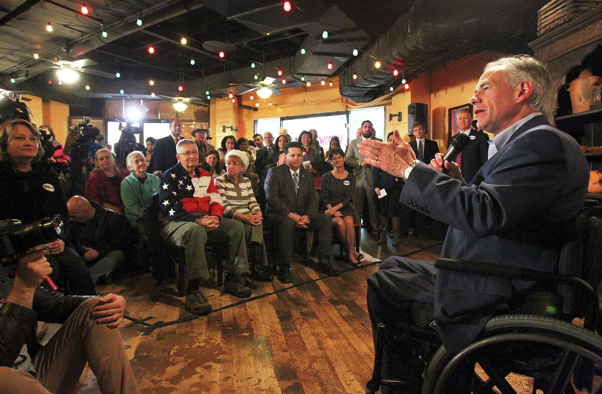 Attorney General Greg Abbott leads a get out the vote rally at Rita's on the River on February 26, 2014.