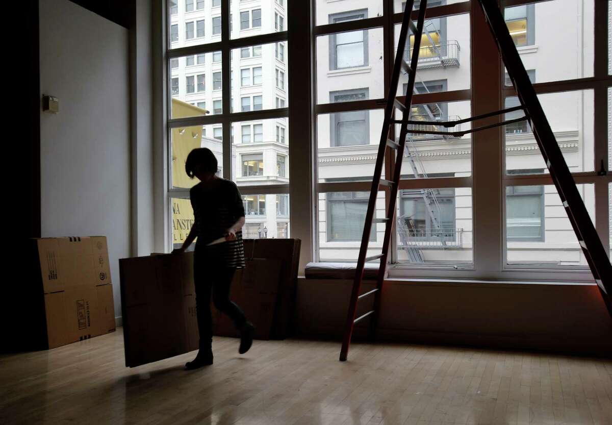 Jessica Daniel of the Rena Bransten Gallery retrieved more boxes for the upcoming move in San Francisco, Calif. Wednesday February 26, 2014. Rising rents in downtown San Francisco are forcing some gallery owners to move like the Rena Bransten Gallery on Geary Street.