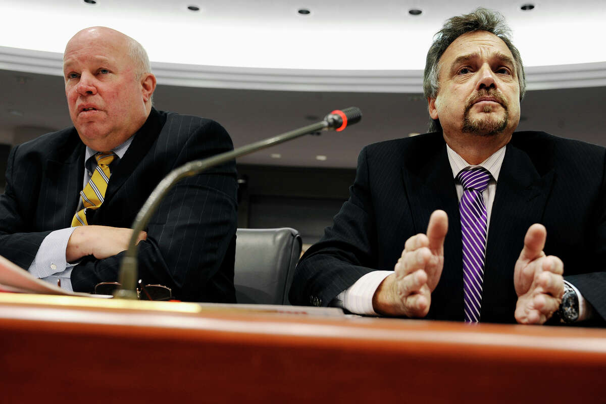 Metro-North's new president, Joseph Giulietti, right, gestures has he speaks at an informational hearing of the Connecticut General Assembly's Transportation Committee, as Thomas F. Prendergast, chairman and chief executive of the Metropolitan Transportation Authority, left, listens, at the Legislative Office Building, Thursday, Feb. 27, 2014, in Hartford, Conn. Metro-North Railroad's two top executives have told Connecticut legislators that the commuter rail line has installed new technology, slowed trains and made internal management changes to improve service.