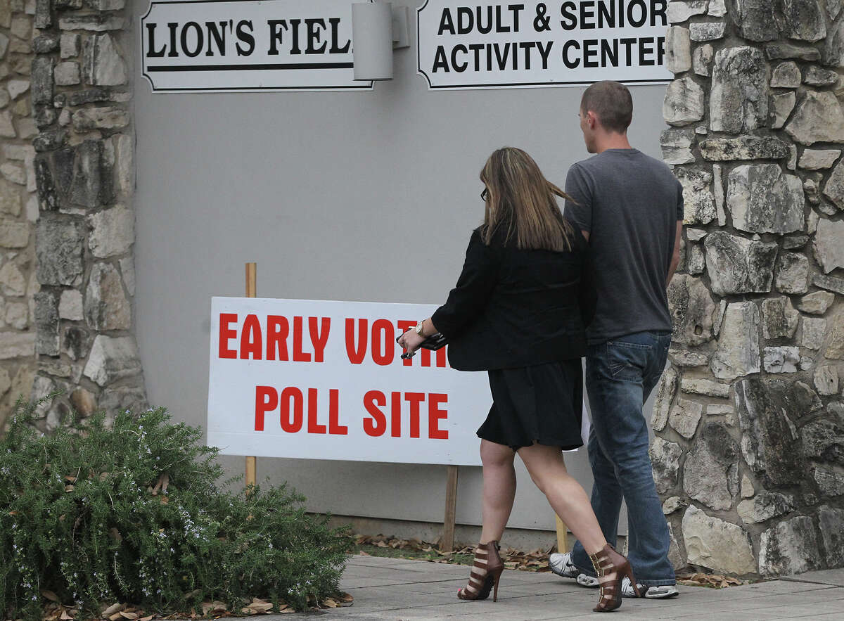 People head to the polling site at Lion's Field Park Friday February 28, 2014 on the last day of early voting for the March 4 primary.