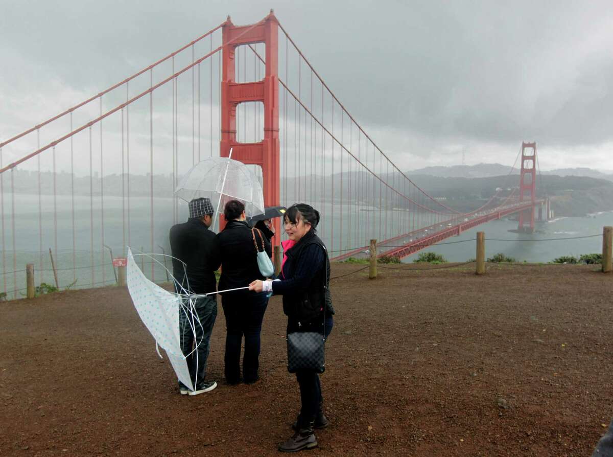 The wind was too much for Gee Olivar’s umbrella during her visit to the Marin Headlands in February 2014. The Bay Area could see some much-needed rain late this weekend and early next week, forecasters said Wednesday, April 1, 2015.