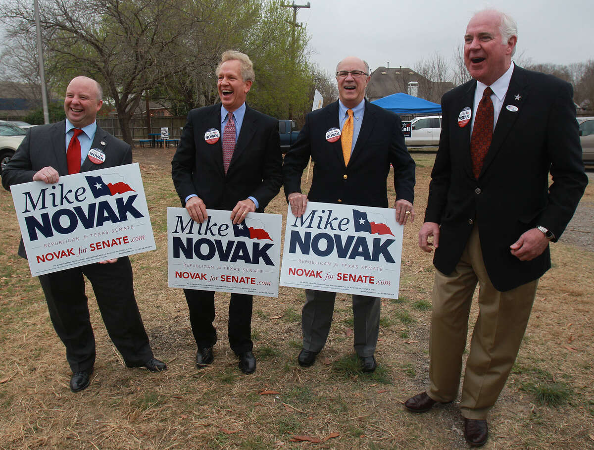 Texas Senate candidate Mike Novak (right) receives support from County Commissioner Kevin Wolff (left), Tim Bannwolf (second from left) and Carroll Schubert.