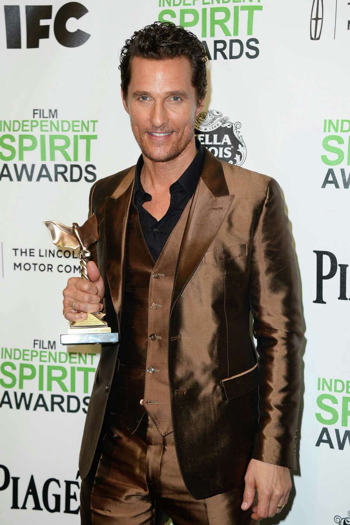 Matthew McConaughey poses with the award for best male lead for "Dallas Buyers Club" in the press room at the 2014 Film Independent Spirit Awards, on Saturday, March 1, 2014, in Santa Monica, Calif. (Photo by Jordan Strauss/Invision/AP)