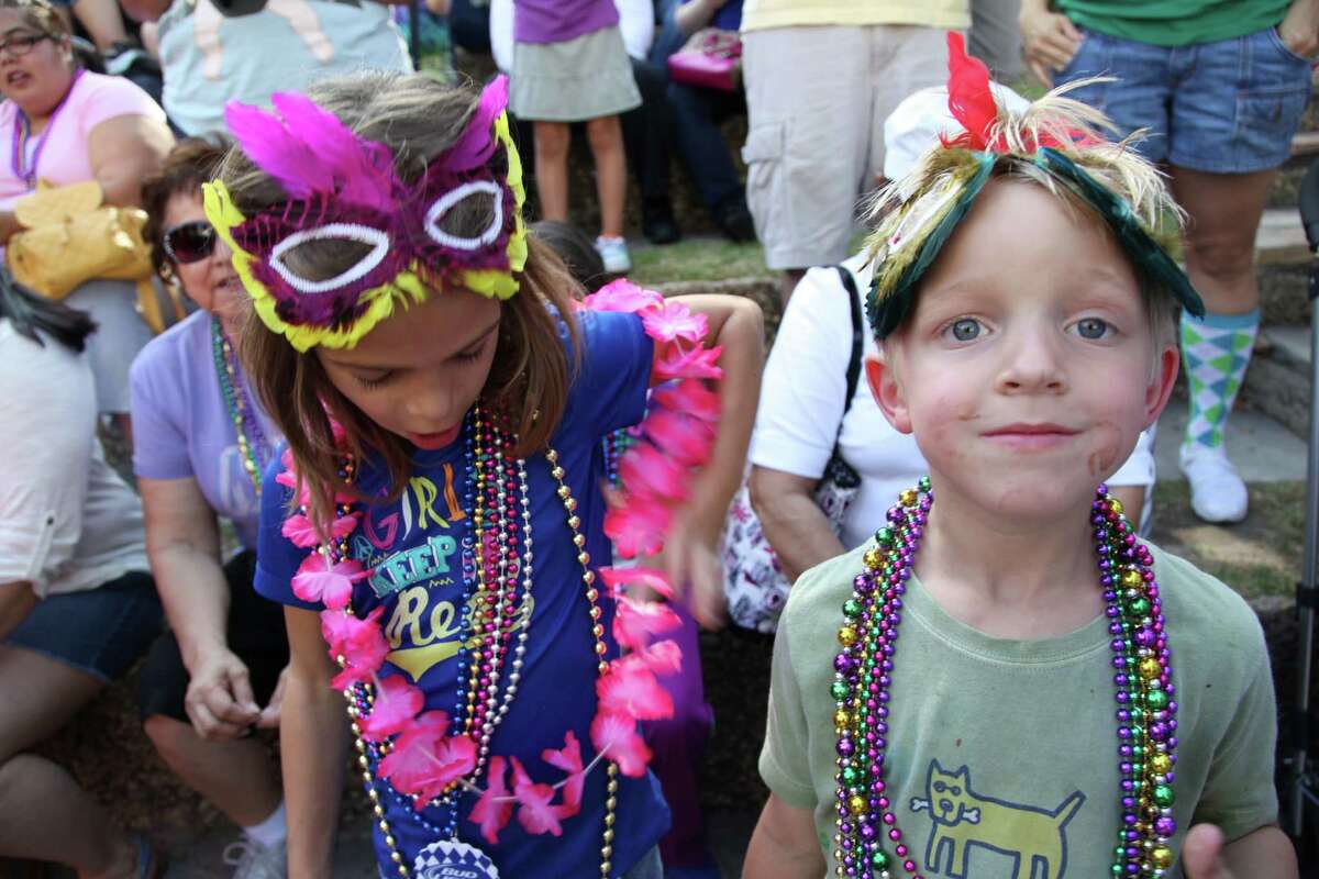 Check out who got festive at the Mardi Gras parade.