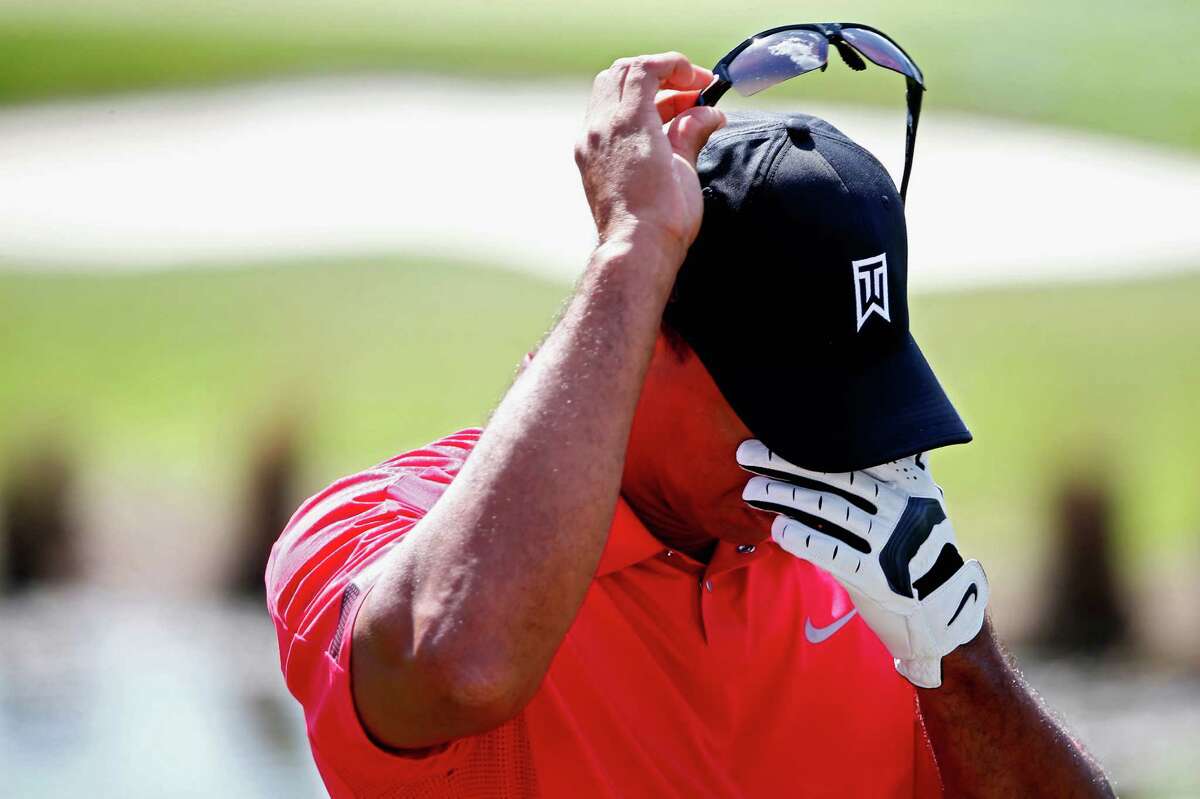 Sunday was a tough day golf-wise and health-wise for Tiger Woods, who withdrew on the 13th hole.