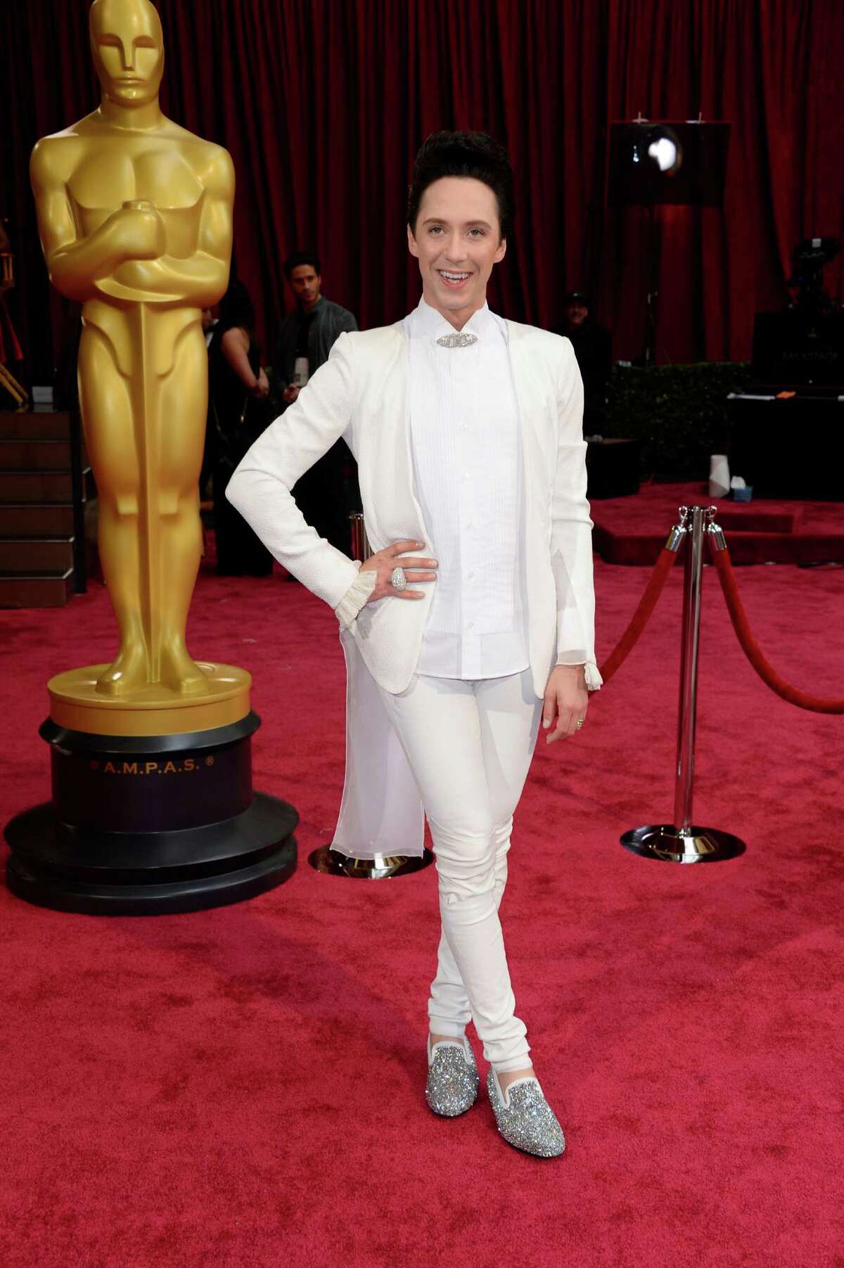 'Hunger Games or Olympics?' Johnny Weir's eyecatching outfits light up
