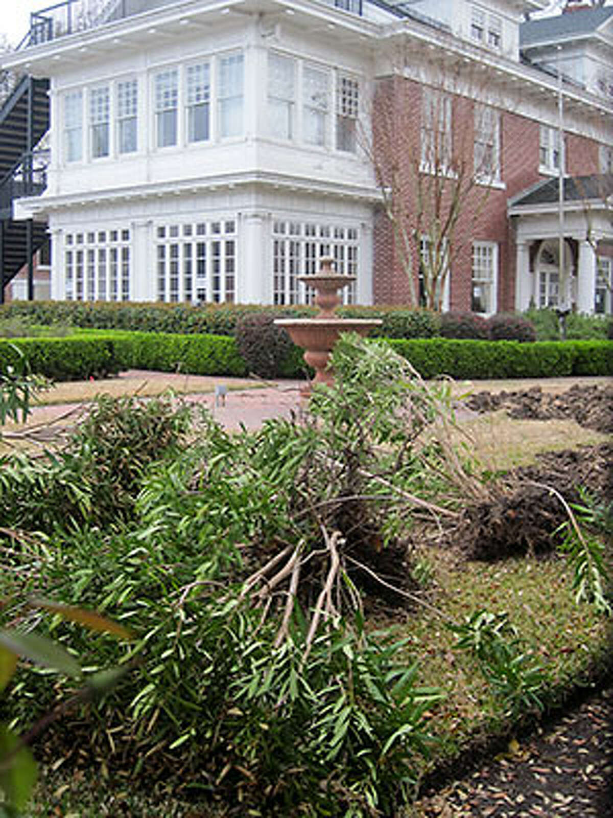 Bullock-City federation mansion is known as the first house in Houston to be fitted with Central A/C.  Construction workers moved in to remove interior fittings after a demolition permit was filed Feb 14th 2014.