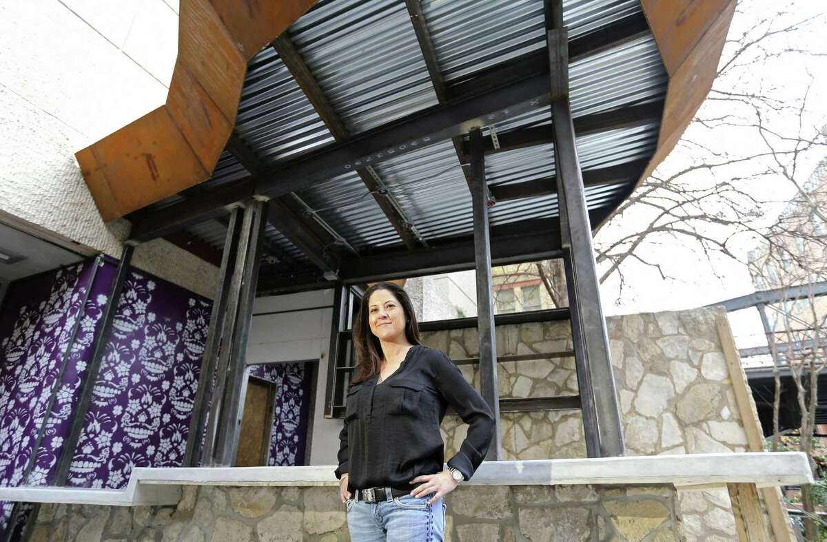 Lori Urbano, owner of Urbano Design & Build, stands near a bar she designed that is under construction at The Worm Tequila & Mezcal Bar on the River Walk. She is one of just a few Hispanic women who own construction companies in San Antonio