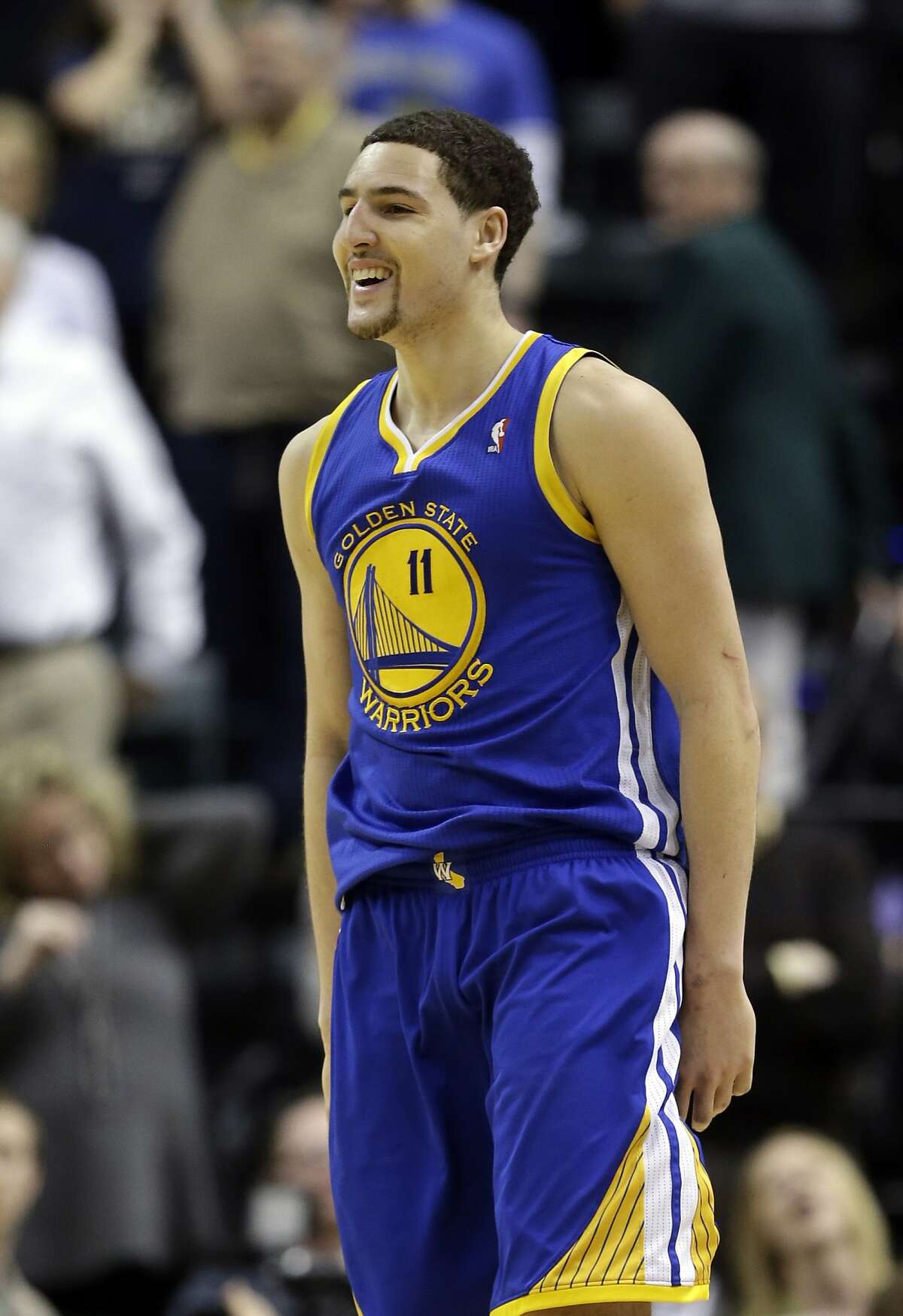 Golden State Warriors' Klay Thompson smiles after putting up the game winning shot late in the second half of an NBA basketball game against the Indiana Pacers Tuesday, March 4, 2014, in Indianapolis. Golden State defeated Indiana 98-96. (AP Photo/Darron Cummings)