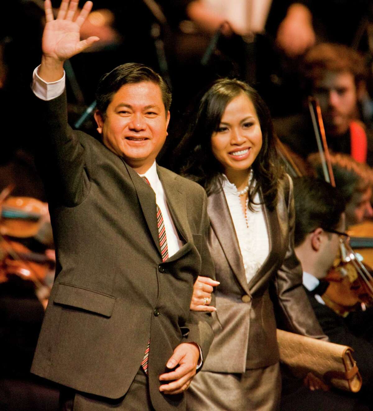 City Councilman Al Hoang waves to the crowd during the ceremonial and public swearing in of Mayor Annise Parker and the rest of the Houston City Council members, Monday, Jan. 4, 2010, at the Wortham Theater in Houston. ( Karen Warren / Chronicle )