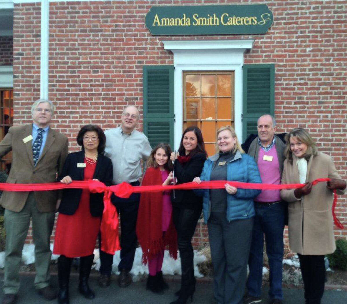 At the ribbon-cutting ceremony for the opening of new space for Amanda Smith Caterers, of Darien, are from left, John Lundeen, Lundeen Cliffside Associates and a Darien Chamber of Commerce board member; Board, Kaye Leong, Darien Rowayton Bank and DCC board member; Maruca Smith; Amanda Pilar Smith, owner of Amanda Smith Caterers; Laurie Griffith, Darien Bank & Trust and DCC board member; Bill Jensen, Darien Toy Box and DCC board member; and Lauren Spicehandler, Darien Times and DCC board member.